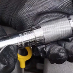 Torque Wrench in Technician Hands